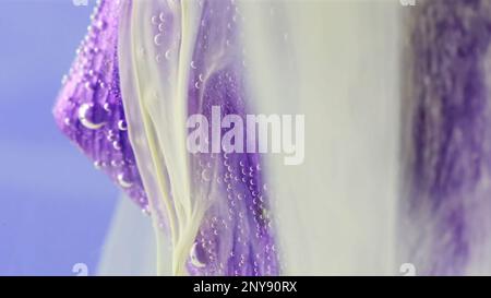 Flower smoke motion. Stock footage. Underwater illusion with paint spreading along the petals of a flower underwater Stock Photo