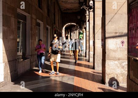 Bilbao, Spain - August 02, 2022: Arcade in the Erribera Kalea, the old town of Bilbao Stock Photo
