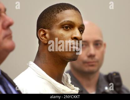 Anthony Rutherford listens during his arraignment in court in