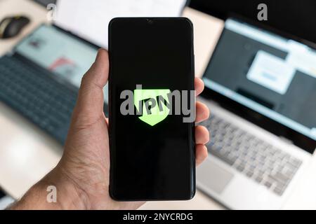 VPN - Virtual Private Network - Cyber Security and Privacy Data Encryption Software Solutions for Business concept. smartphone with vpn app for anonym Stock Photo