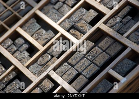 Antique motiv stamps for printing in the type case Stock Photo