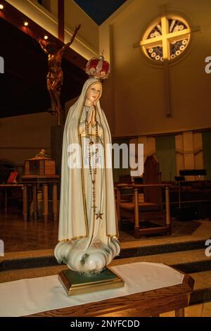 The world-famous International Pilgrim Virgin Statue of Our Lady of Fatima sculpted in 1947 by Jose Thedim; at St. Ambrose Catholic Church. Stock Photo