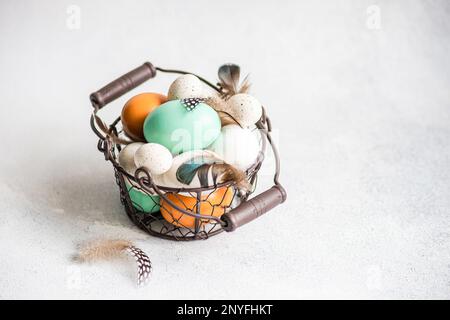 From above basket with easter card concept with eggs on concrete background Stock Photo