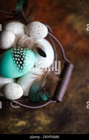From above basket with easter card concept with eggs on concrete background Stock Photo