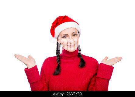 Girl in Santa Hat showing/presenting with two hands open empty for product or text. Isolated on a white background. Stock Photo
