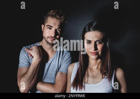 Couple posing in studio Stock Photo