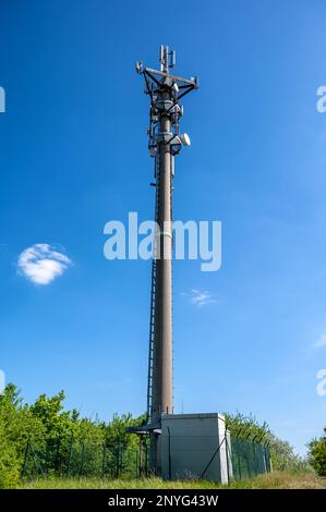 Modern transmission tower for mobile communications and Internet Stock Photo