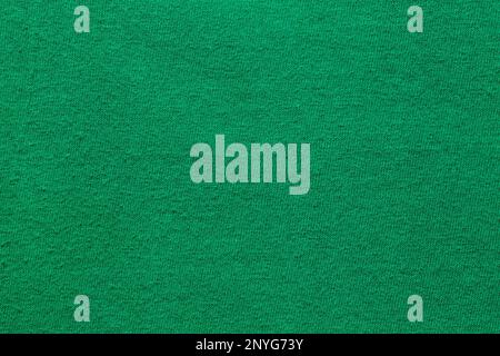 Dark green velvet texture background. Green velvet fabric Stock Photo