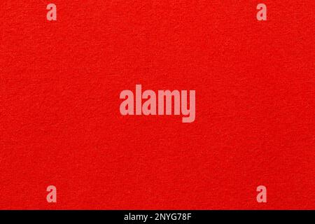 Dark red cloth color texture wall as background. Stock Photo