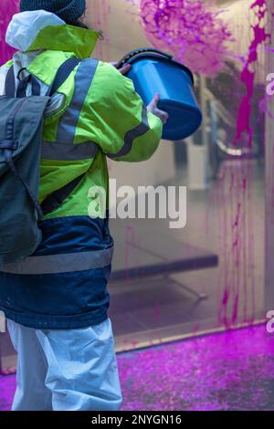 London, England, UK 02/03/2023 Extinction Rebellion targets UK Finance's headquarters at Angel Court in protest at corruption in the banking system and how it prioritises profit over people and planet. Six protesters threw pink paint (a concoction of pond dye, water and guar gum) at the windows and covered them with posters of Rishi Sunak saying This Bill Will Kill. Later all six were arrested. The action coincides with passing of the Financial Services and Markets (FSM) Bill through the committee stage in Parliament and in its current form includes no environmental protections. Stock Photo