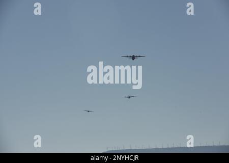 Three U.S. Air Force C-130J Super Hercules aircraft participate in a fly-over during exercise Chasing Sol near Zaragoza, Spain, Feb. 2, 2023. Chasing Sol included three C-130J Super Hercules aircraft assigned to the 37th Airlift Squadron,  and a Spanish A400M Atlas aircraft and Casa C-295 aircraft. Stock Photo