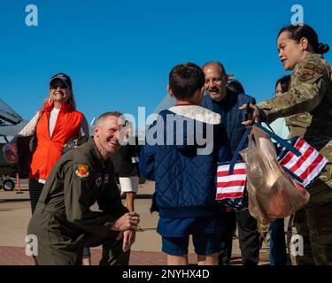 Brig. Gen. Jason Rueschhoff, 56th Fighter Wing commander, and his family  attend the Arizona Cardinals Salute to Service event Nov. 6, 2022, at State  Farm Stadium, Glendale, Arizona. Rueschhoff later sounded the