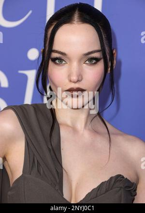 INGLEWOOD, LOS ANGELES, CALIFORNIA, USA - MARCH 01: Dove Cameron wearing a Jacquemus dress, Giuseppe Zanotti shoes, and Tyler Ellis clutch arrives at the 2023 Billboard Women In Music held at the YouTube Theater on March 1, 2023 in Inglewood, Los Angeles, California, United States. (Photo by Xavier Collin/Image Press Agency) Stock Photo