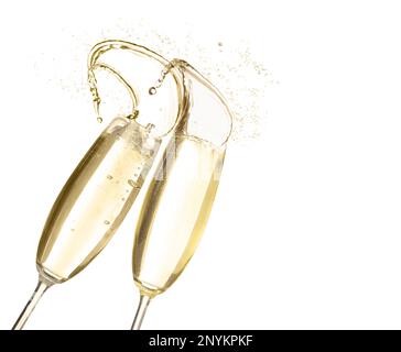 Clinking glasses of sparkling wine with splash on white background Stock Photo