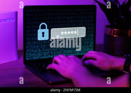 Man typing password on personal computer. Close up shot of cyber security concept. High quality photo Stock Photo