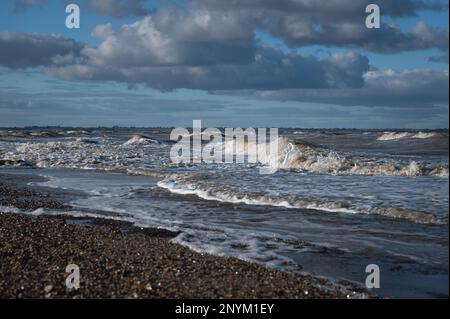 Seascape. Waves crashing in Walton on the Naze in Essex on a windy, cold, winter day. Stock Photo