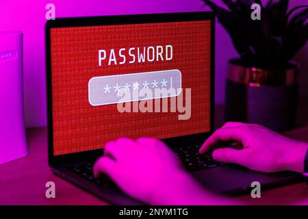 Man typing password on personal computer. Close up shot of cyber security concept. High quality photo Stock Photo