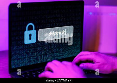 Man typing password on personal computer. Close up shot of cyber security concept. High quality photo Stock Photo