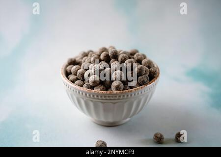 Raw black tapioca pearls - Ingredient for Boba bubble tea, selective focus Stock Photo