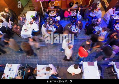 Bars and restaurants in Nevizade street, near Istiklal pedestrian street in Beyoglu area Istanbul, Turkey Stock Photo