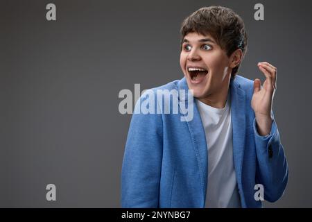 shocked man with surprise expression and excited face Stock Photo