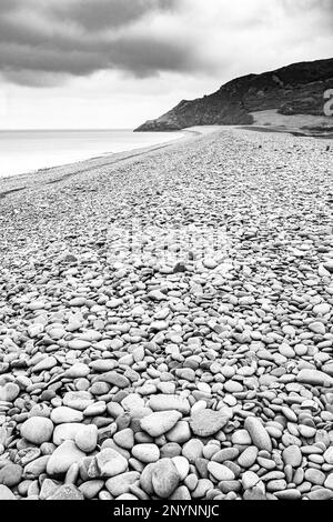 The stony beach at Bossington (looking towards Hurlstone Point) on the north coast of Exmoor National Park, Somerset, England UK Stock Photo