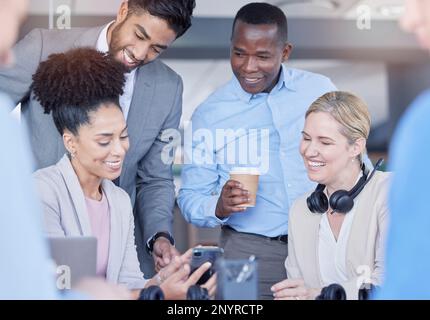 Meeting, phone and group of business people in the office browsing on social media together. Discussion, diversity and corporate team or friends Stock Photo