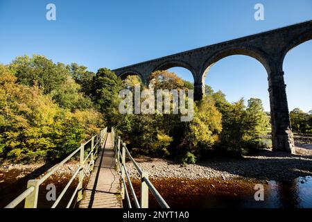 Lambley Railway Viaduct crossing the River South Tyne in Northumberland. Once the railway between Haltwhistle and Alston now the South Tyne Trail.Sout Stock Photo