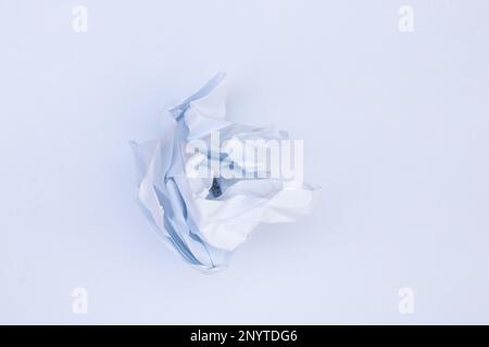 crumpled white paper on an isolated background Stock Photo