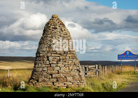 Shorngate Cross Currick or Stone Cairn on the border of County Durham and Northumberland, between Allendale and Weardale, North Pennines Stock Photo