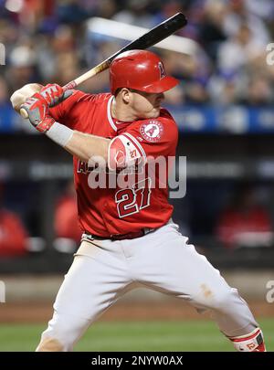 American League's Mike Trout (27) slides in safe ahead of the tag