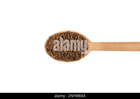Valerian herb root on wooden spoon isolated on white background. Valeriana officinalis. used in herbal medicine as a tranquillizer and to treat insomn Stock Photo