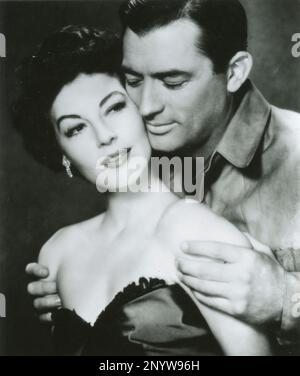 American actor Gregory Peck and actress Ava Gardner in the movie The Snows of Kilimanjaro, USA 1952 Stock Photo