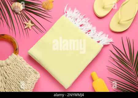 Flat lay composition with different beach objects on pink background Stock Photo