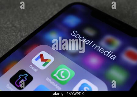 MYKOLAIV, UKRAINE - AUGUST 10, 2021: Apple iPhone X with different social media icons on screen, closeup Stock Photo