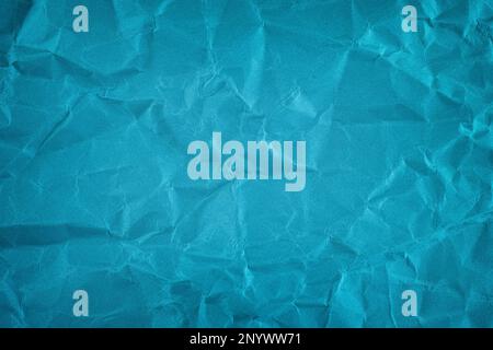 A crumpled blue paper background. Close up. Stock Photo