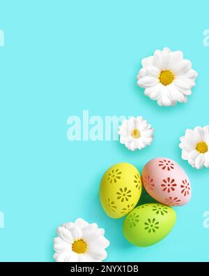 Easter holiday background with colorful easter eggs and white flowers on blue background. Top view from above Stock Photo