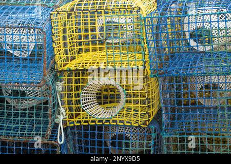 blue and yellow Lobster pots in southern Portugal Stock Photo