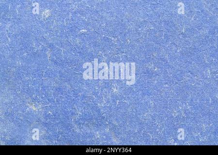 Old light blue colored paper worn out grunge retro vintage blue sheet of parchment paper background texture, old book cover quality hi res material st Stock Photo