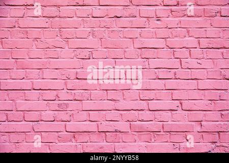 pattern of old brick wall painted in pink color Stock Photo