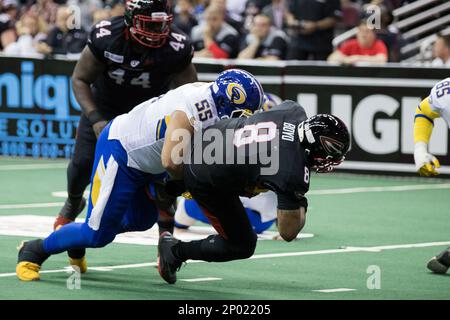 CLEVELAND, OH - APRIL 08: Tampa Bay Storm QB Randy Hippeard (12) scrambles  during the third quarter of the Arena League Football game between the Tampa  Bay Storm and Cleveland Gladiators on