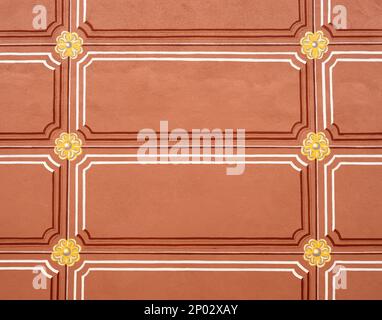 Background image with the orange pattern on the medieval wall Stock Photo