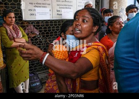 A Woman Cries Due To The Serious Health Condition Of Her Child Having ...