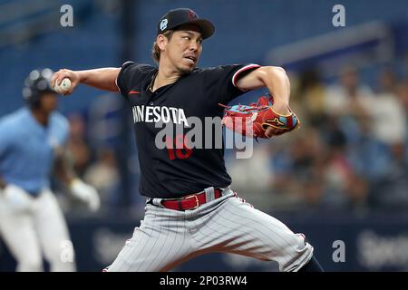 ST. PETERSBURG, FL - MARCH 02: Minnesota Twins infielder Brooks Lee (72)  throws the ball over to first base during the MLB spring training game  between the Minnesota Twins and the Tampa