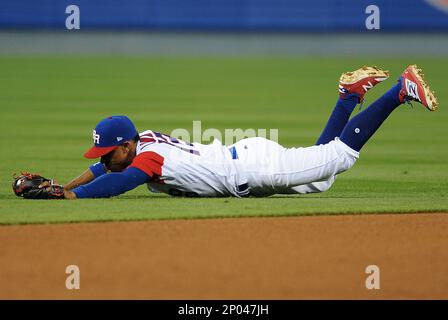 Puerto Rico infielder Francisco Lindor, right, yells after he tagged out  Nicaragua's Juan Diego Montes (99) as Montes tried to steal the second base  during the fourth inning of a World Baseball