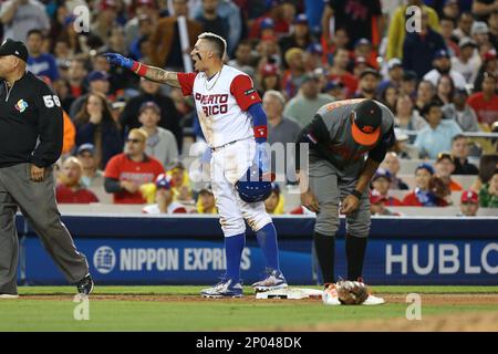 Puerto Rico second baseman Javier Baez (9) returns to the dugout during a  World Baseball Classic game against Nicaragua, Saturday, March 11, 2023, in  Miami. (AP Photo/Marta Lavandier Stock Photo - Alamy