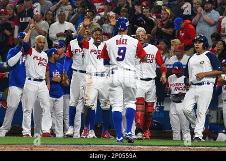 Puerto Rico second baseman Javier Baez (9) returns to the dugout during a  World Baseball Classic game against Nicaragua, Saturday, March 11, 2023, in  Miami. (AP Photo/Marta Lavandier Stock Photo - Alamy