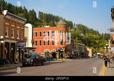 The historic Fairmont Hotel restaurant, saloons, bars, and other attractions bring visitors the Old West on Main St in Deadwood, SD. Stock Photo