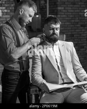 Styling with shaver. Barber scissors. Shaving man and razor man. Barber shop tools on old wooden background with copy space. Barber shop design. Hair Stock Photo