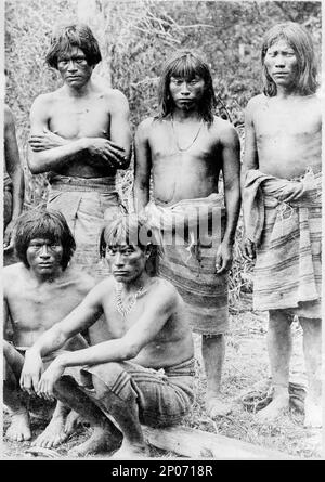 Group of head hunters of the upper Amazon, in Brazil. Frank and Frances Carpenter Collection , Published in: 'The World and Its Cultures' chapter of the ebook Great Photographs from the Library of Congress, 2013, Men,Clothing & dress,Amazon River Region,1890-1930, Headhunters,Amazon River Region. Stock Photo